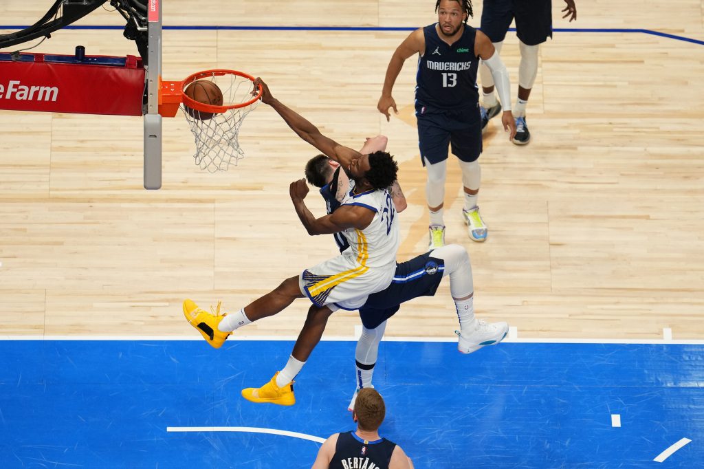 Andrew Wiggins photographing Luka Doncic during Game 3