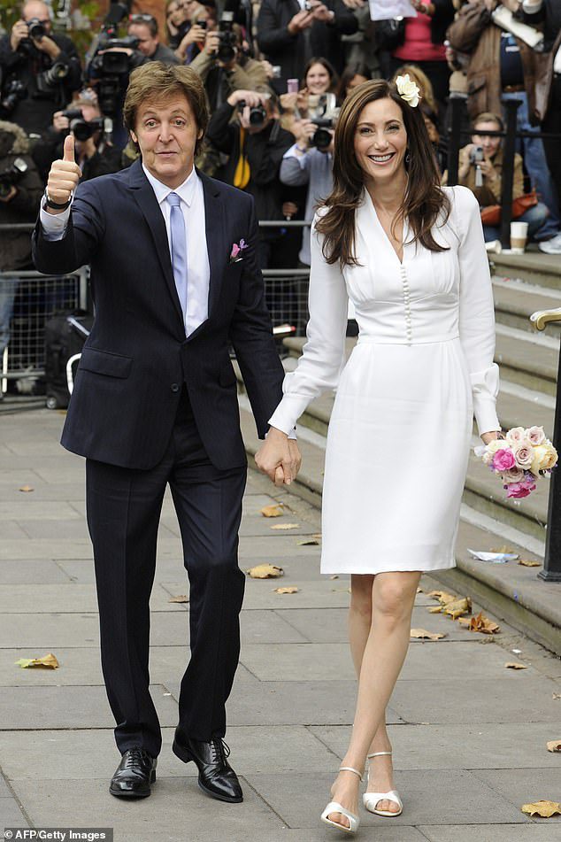 Smitten: Paul and Nancy tied the knot at London's Marylebone Town Hall, after four years of dating (pictured on their wedding day)